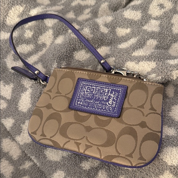 Coach Poppy Signature Tan and Purple Wristlet - Picture 1 of 4